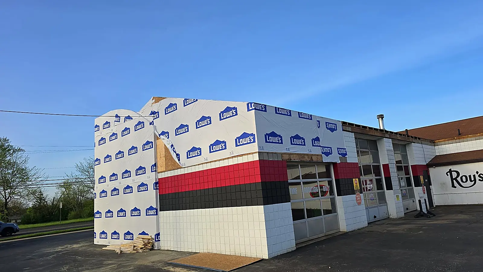 Commercial addition in house wrap beside the original building, Alliance OH
