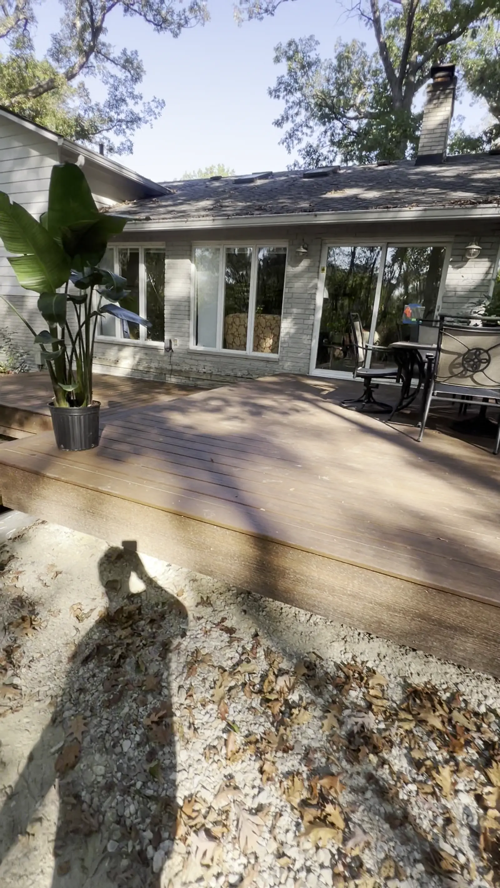 Completed composite deck with picture-frame border on a home in Bloomfield Hills MI, built by Mavericks Construction