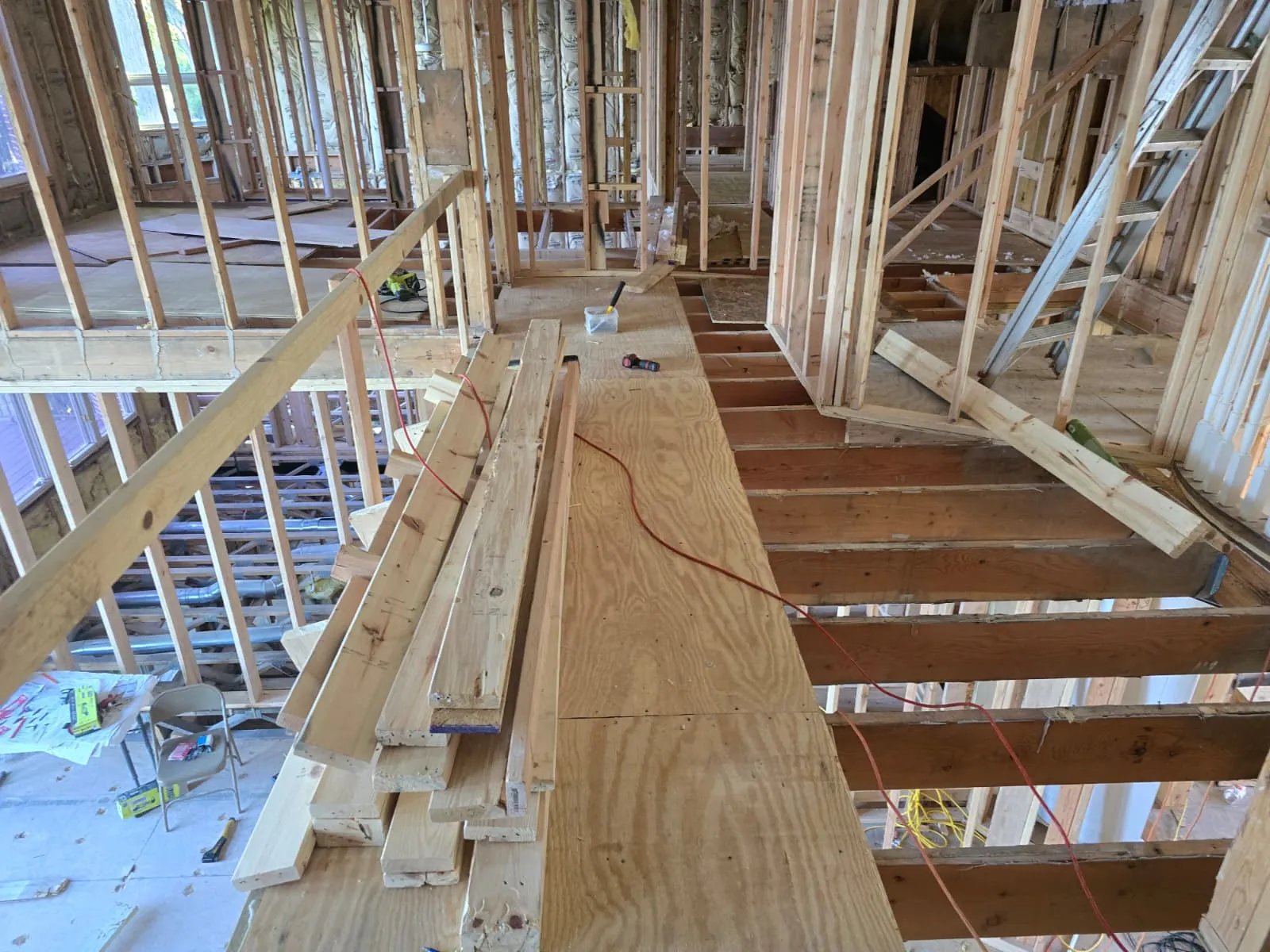 Engineered floor system and stair framing inside a new home under construction