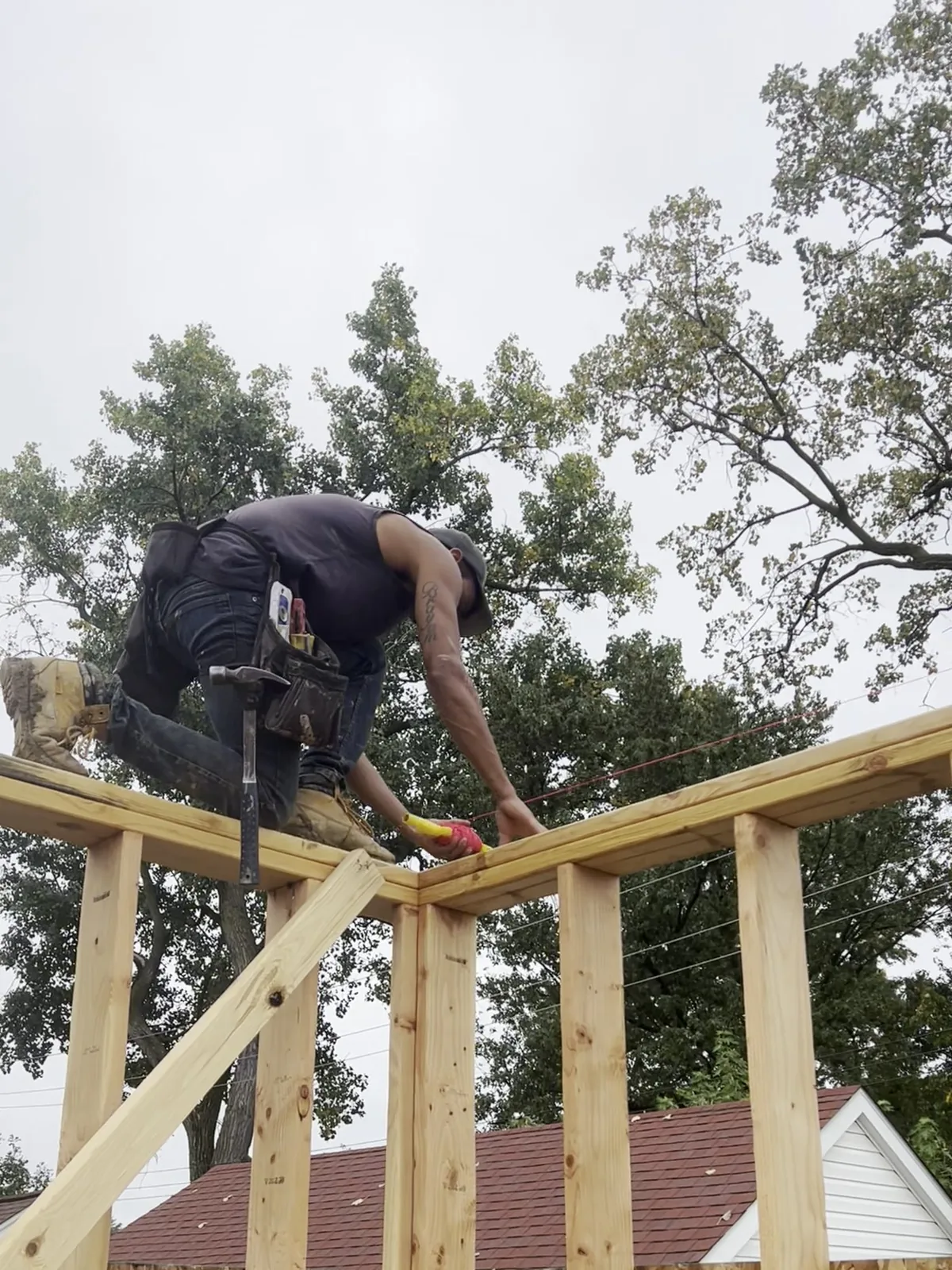 Framer nailing off a second floor wall, Berkley MI