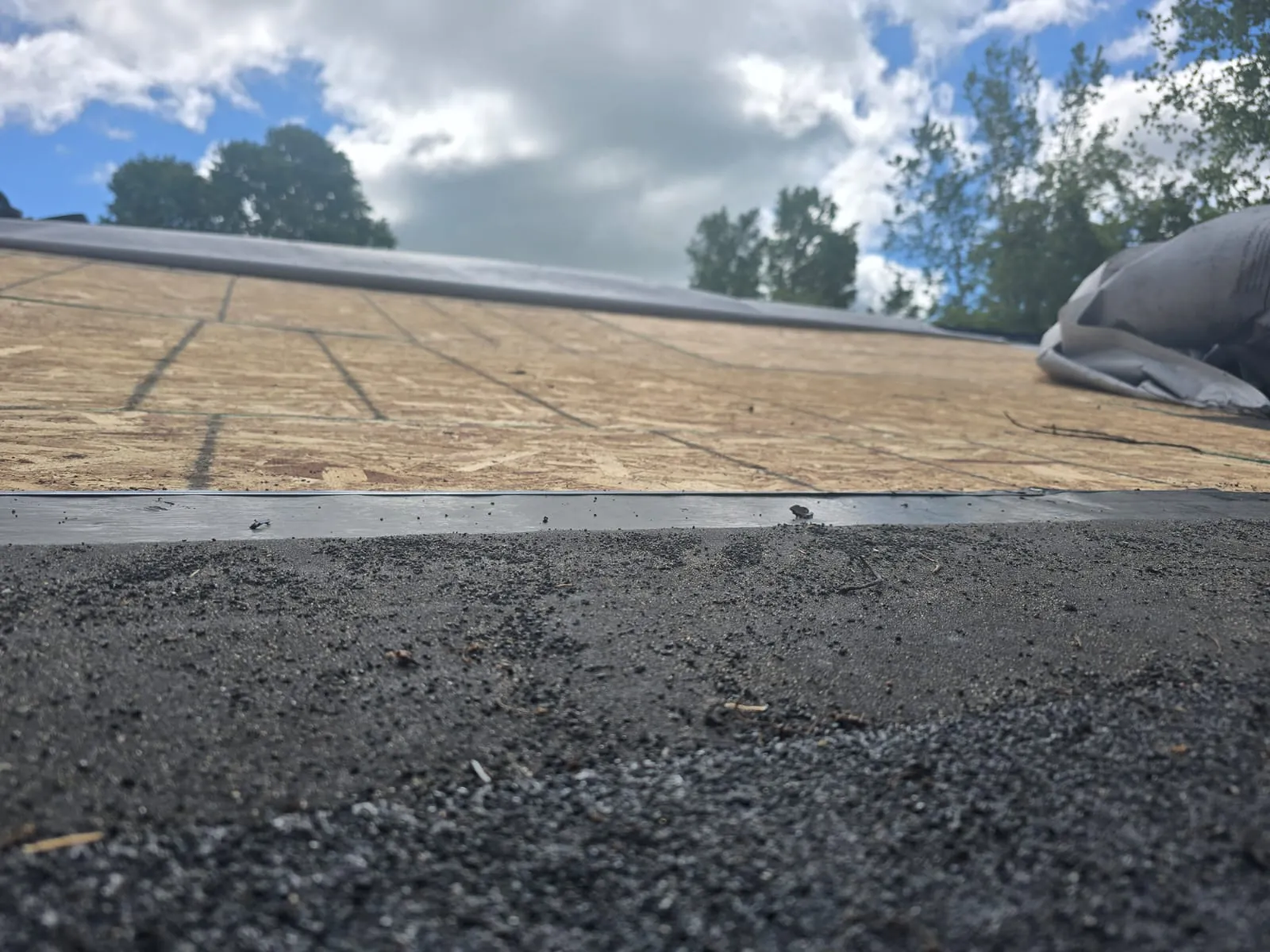 Roof decking installed and ready for underlayment on a re-roof